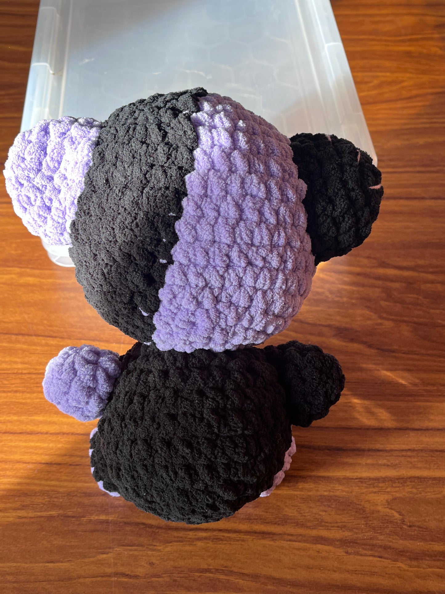 Purple and black bear