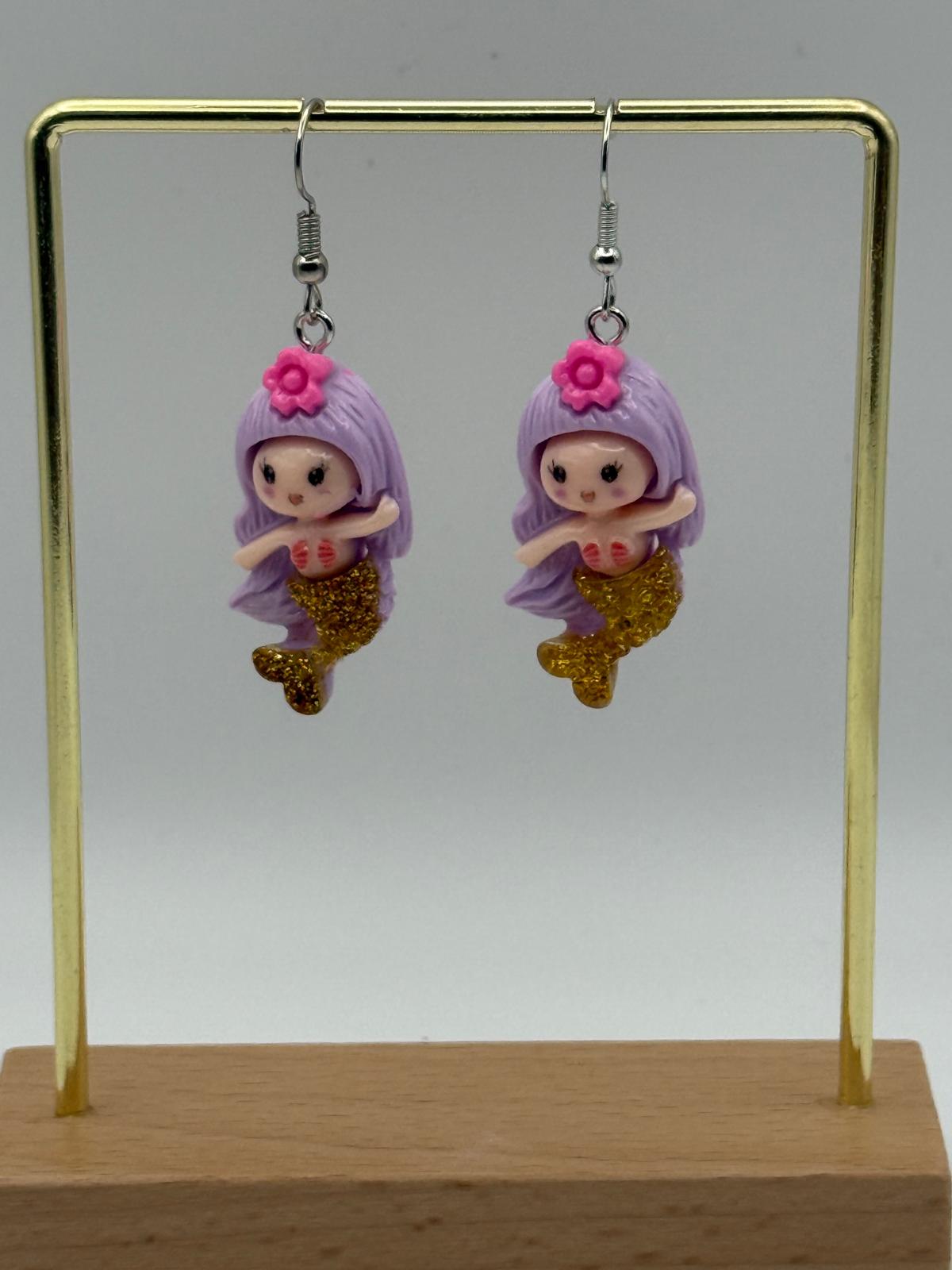 Purple and gold mermaids